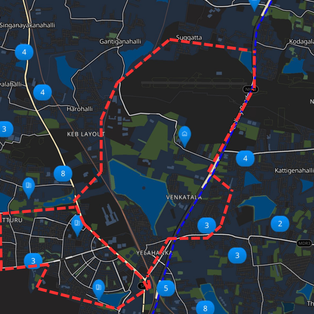 Red outline showing the area of Yelahanka with blue pins marking the spots for upcoming/built gated communities